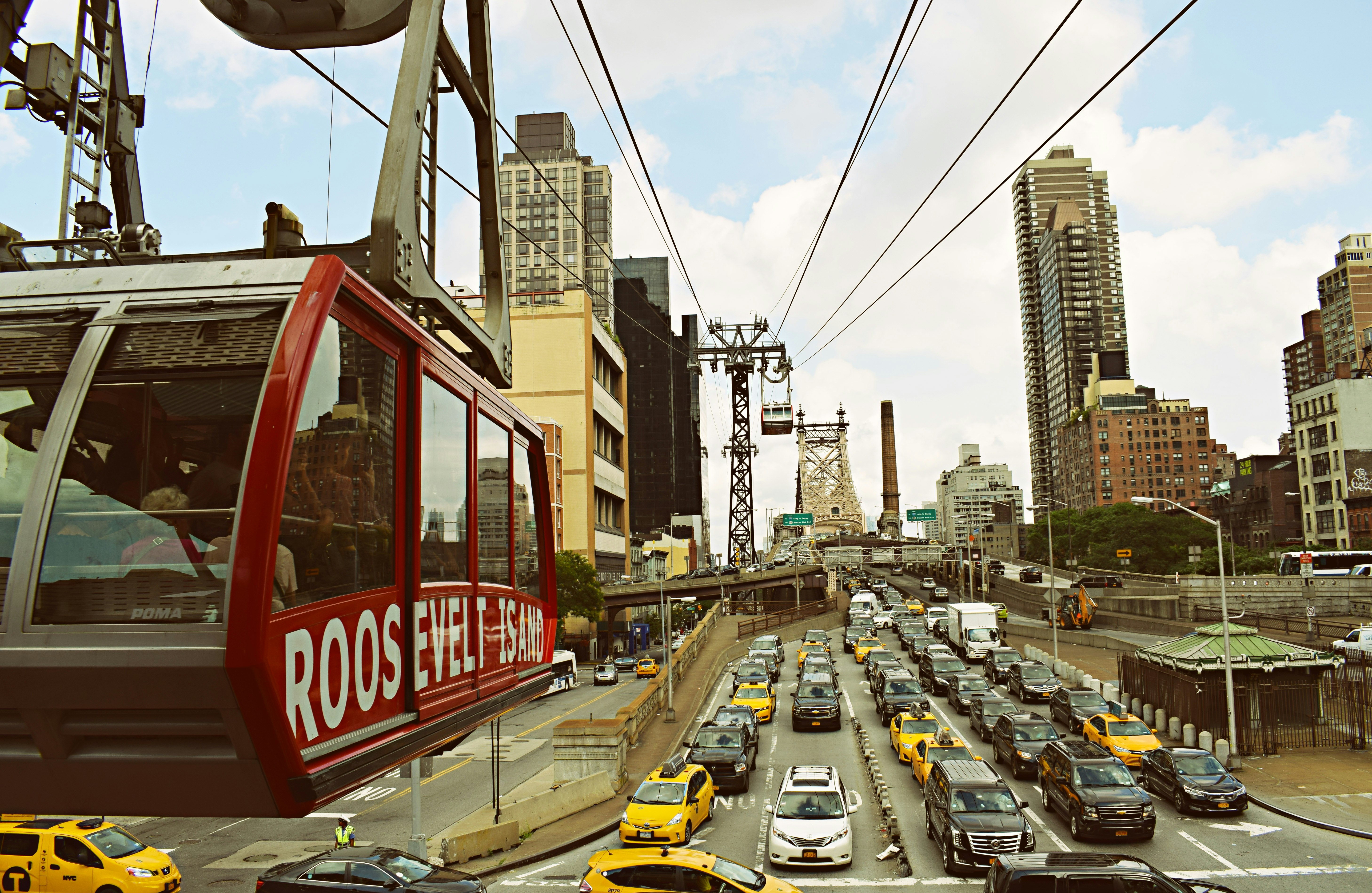 black and white vehicles at road during daytime